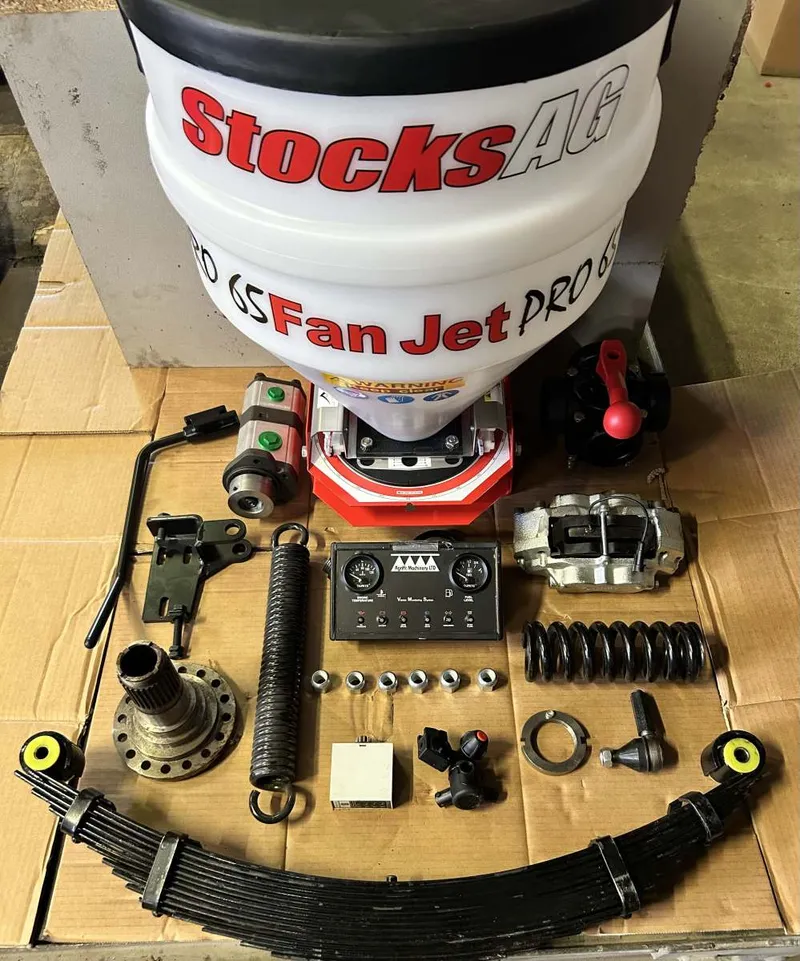 Hydraulic pipe fittings and sprayer parts laid out at Agrifit Machinery York