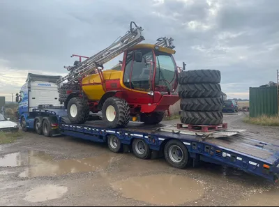 Agribuggy and spare wheels loaded on a trailer at Agrifit Machinery York